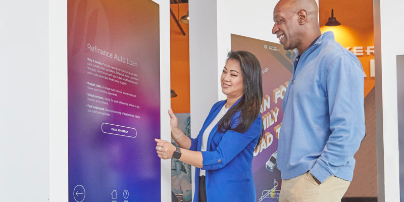 two people playing a game at workers credit union