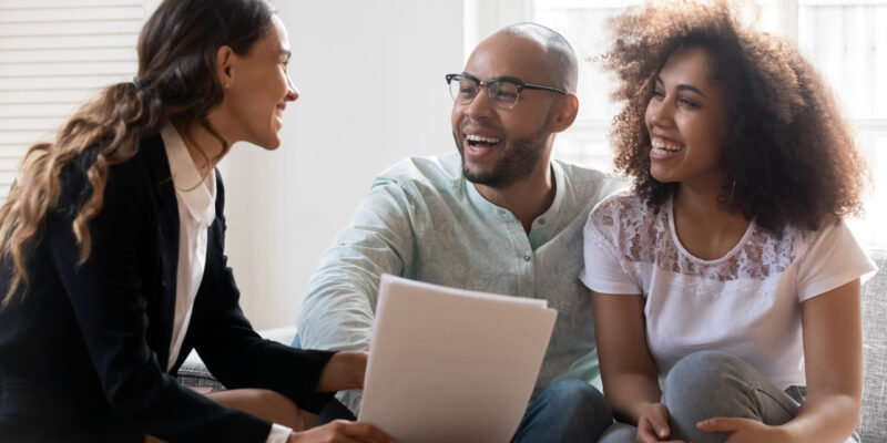 Young couple working with young banker